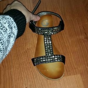 Black leather studded sandals