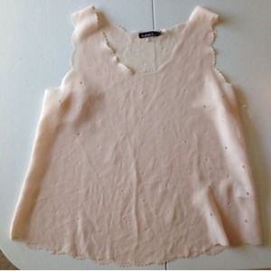 Ivory scalloped sleeveless blouse