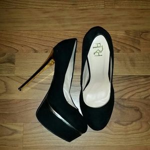 Black suede and gold heels