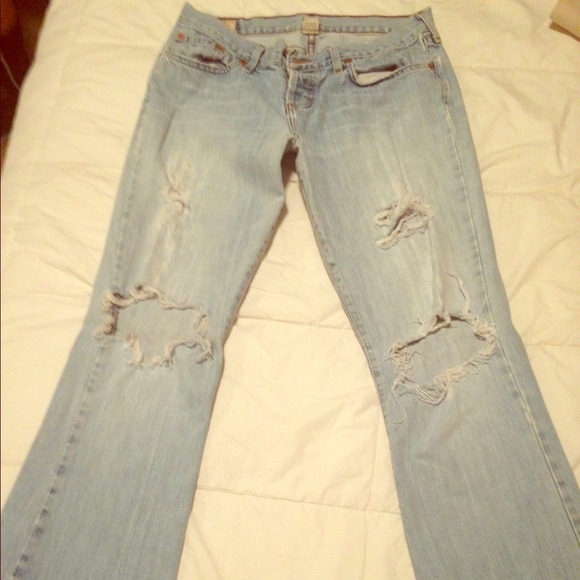 Distressed light wash jeans