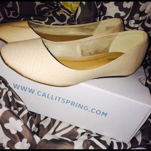 Nude snakeskin flats
