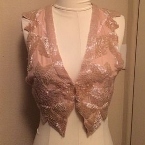 Dusty rose beaded cropped vest.