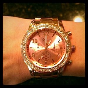 Rose gold designer watch with large face