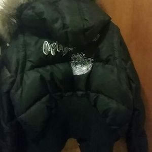 Black hooded fur coat