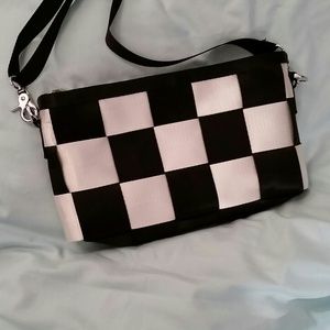 Black and white seat belt purse