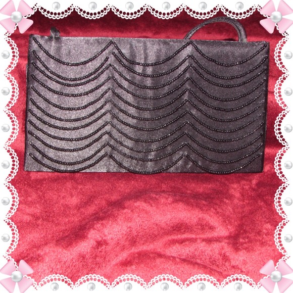 Black clutch... Will throw in for FREE...
