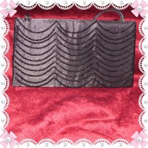 Black clutch... Will throw in for FREE...