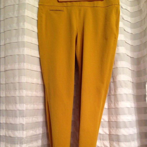 Mustard skinny pants or soft jeans