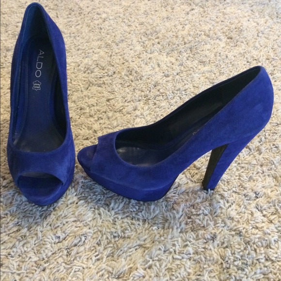ALDO royal blue suede peep toe pumps.