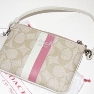 Coach pink beige and white wristlet NO TRADES.