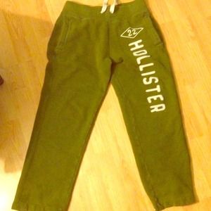 Green Hollister sweatpants.