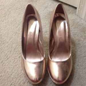Rose gold pumps