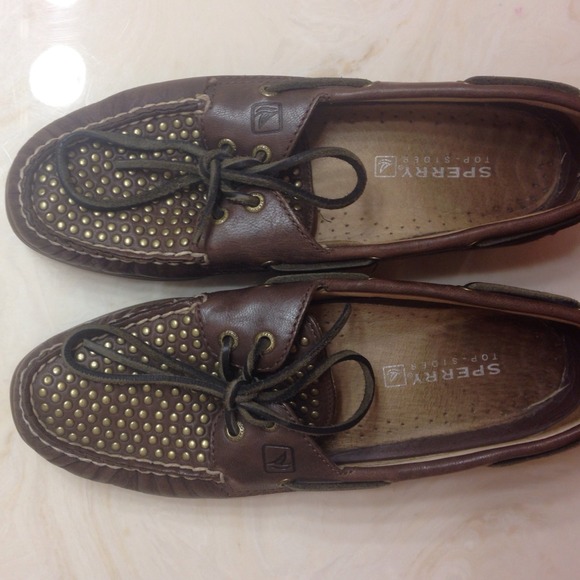 Brown Sperry's with gold studs.