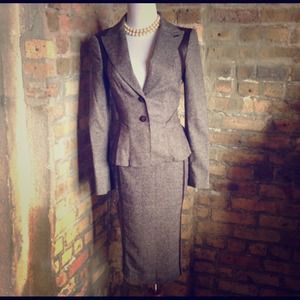 Peplum tweed suit with leather trim price is firm