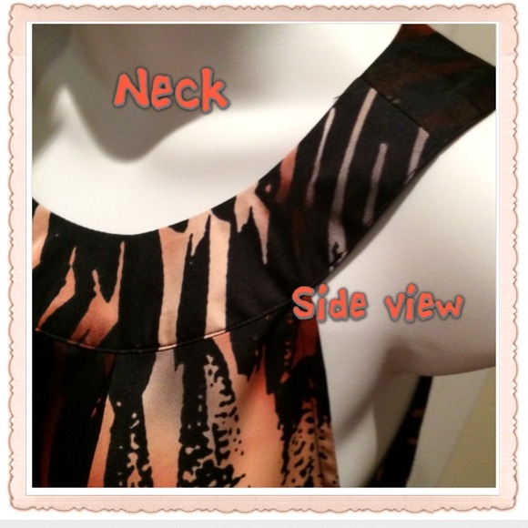 multi- colored shirt. - Picture 2 of 3