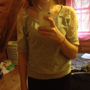Grey sweater with lace shoulders and back.