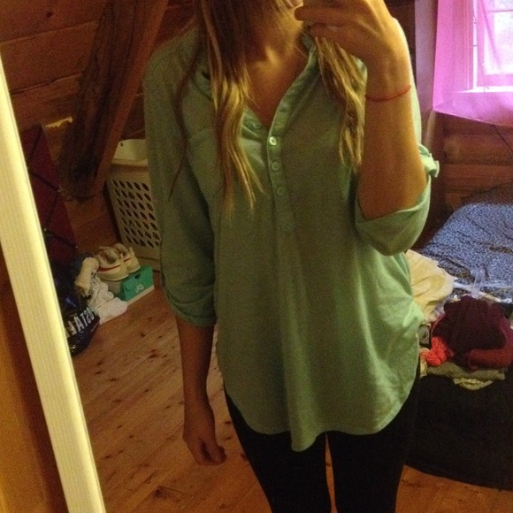 Long baby blue quarter sleeved shirt.