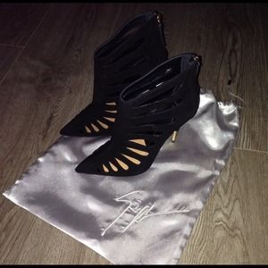 Giuseppe Zanotti cut out, pointy toe ankle boot.