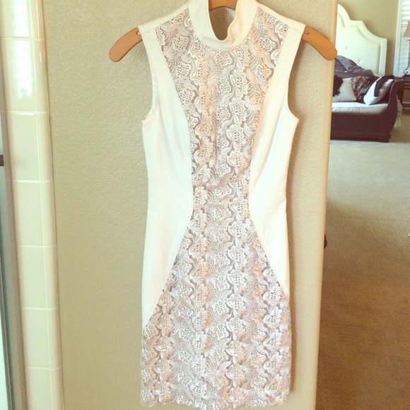 Cream color Bebe dress with floral embroidery