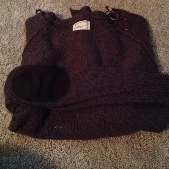 Maroon sweater with brown elbow patches