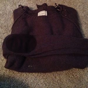 Maroon sweater with brown elbow patches