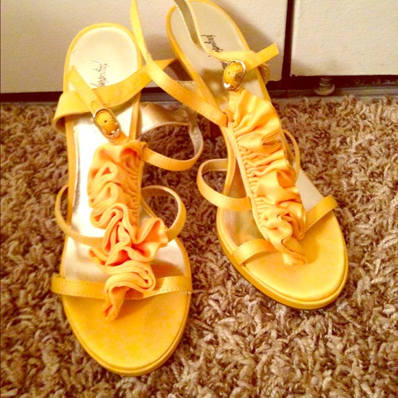 Yellow high heels