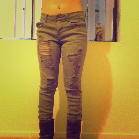 Olive colored distressed jeans size 27