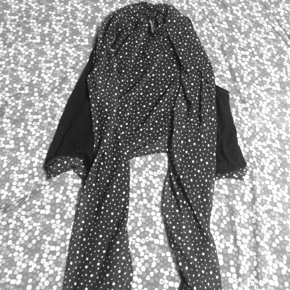Black vest with polka dot lining