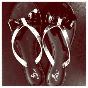 Beautiful black and silver bow sandals!