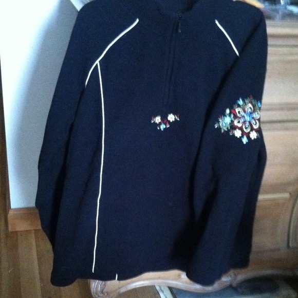 Black 3/4 zip jacket/top.