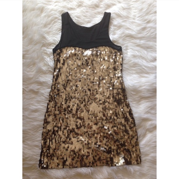Reduced express black on gold sequence dress