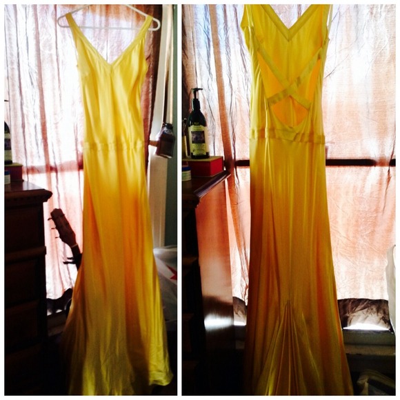 Floor length yellow silk formal evening gown