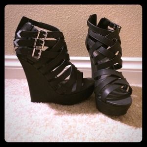 Size 6 Madden Girl Leather Wedges. Worn twice