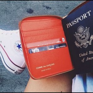 comme de garcons passport holder