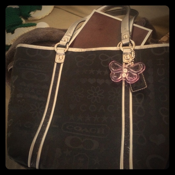 Gently used COACH black imprinted butterfly tote