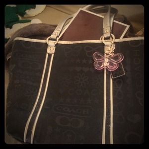 Gently used COACH black imprinted butterfly tote