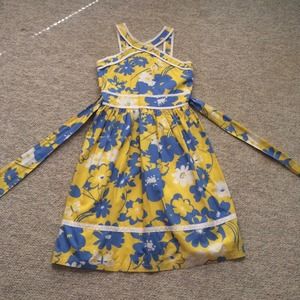 A baby blue and yellow summer dress.