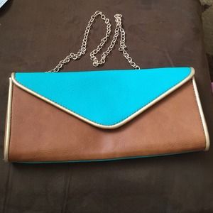 Big Buddha clutch with gold strap