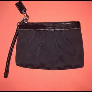 Coach black wristlet NO TRADES.