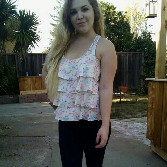 Ruffled layered floral tank.
