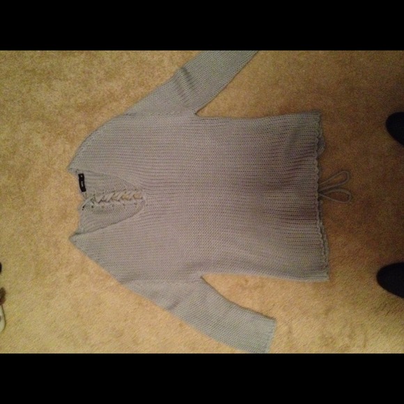 Large tie up sweater. Never worn