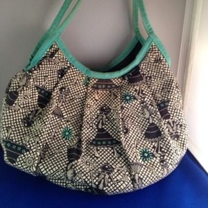 Yakpak dancing skull hobo bag
