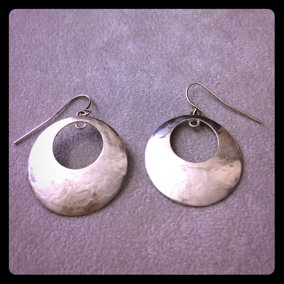Silver circle earrings with embossed metal