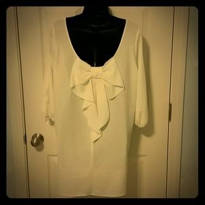 Low cut back with bow dress