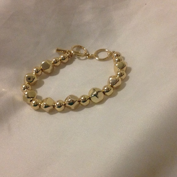 Gold tone bracelet-BRAND NEW