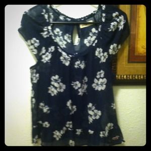 Selling a navy blue floral shirt