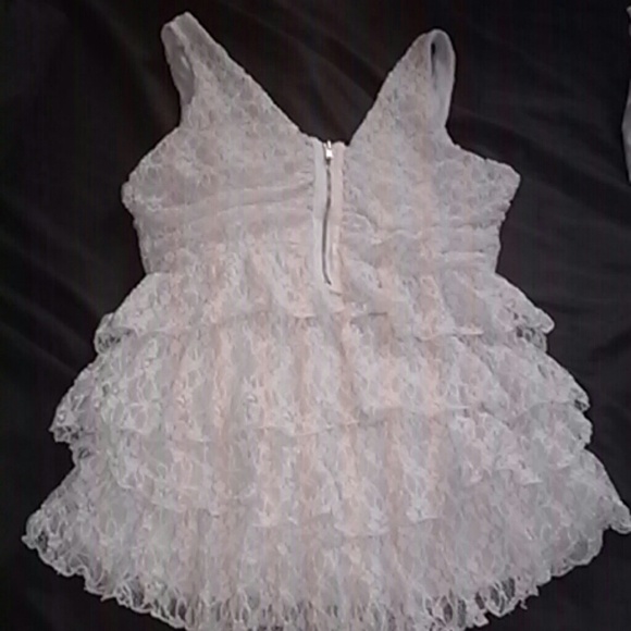 VS Tiered cream lace top with gold zipper