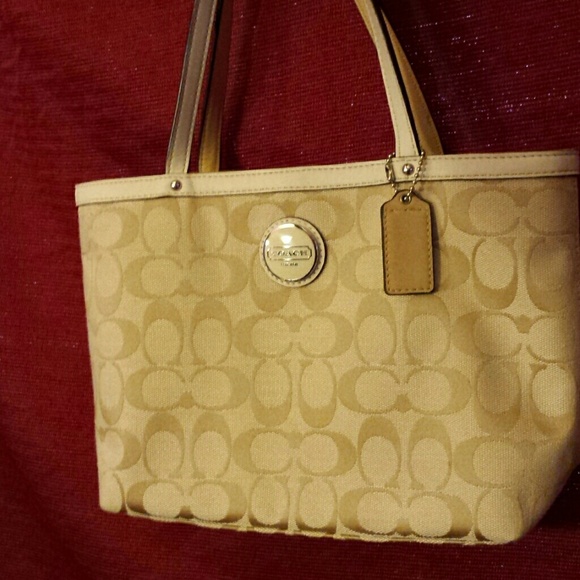 BRand NEW coach!! small size