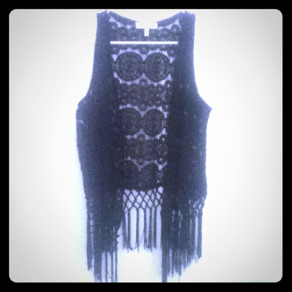 Charlotte Ruuse laced and stringy vest cover thing