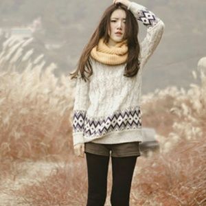 Cable knit sweater in off white